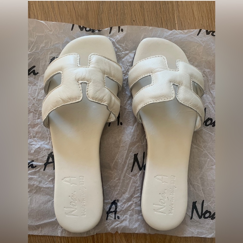 MADE/BOUGHT IN ITALY Soft cream leather slip on sandals. comfy & cute! Not worn.
